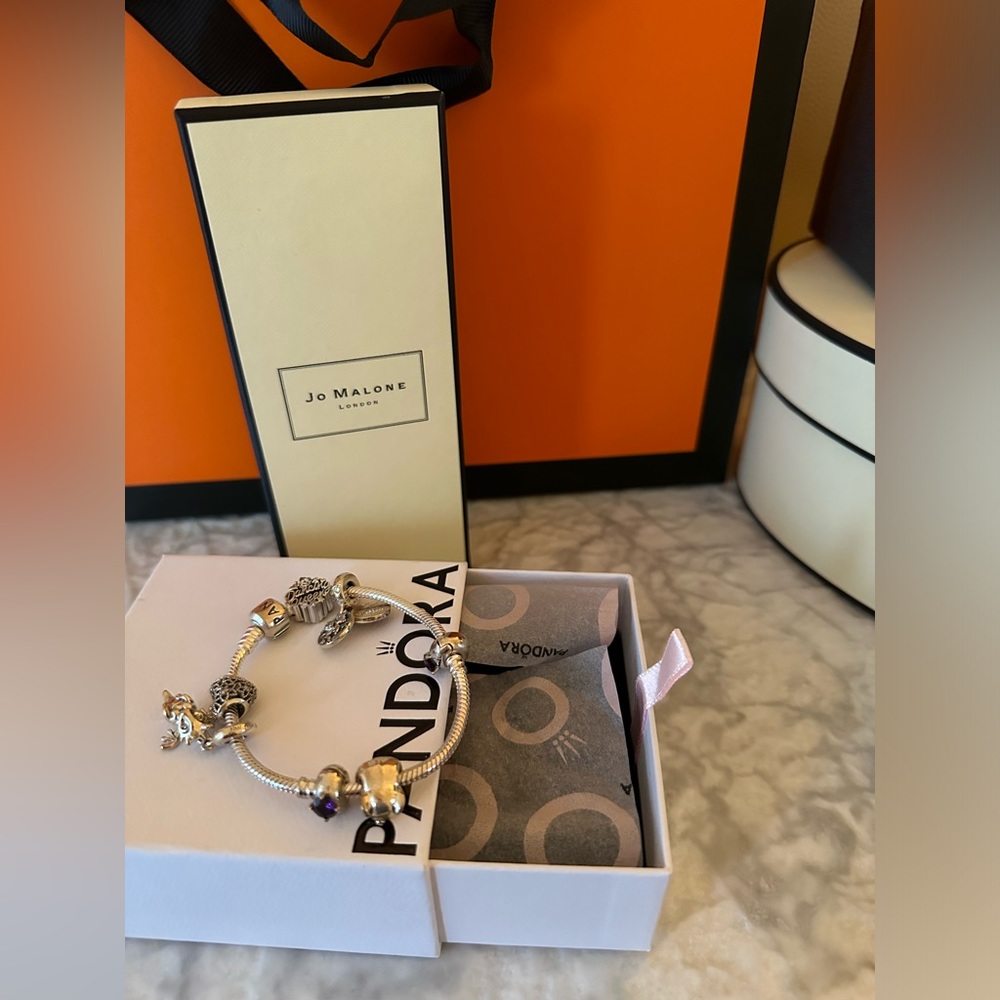 PANDORA bracelet with 7 pendants